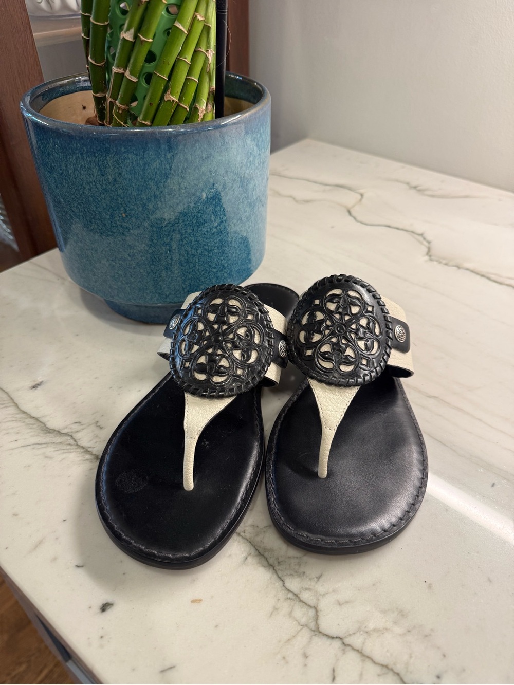 Brighton Black and Cream Women's Leather Thong Sandals with Decorative Medallion